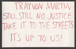 Prostest sign condemning the lack of justice for Trayvon Martin's murder