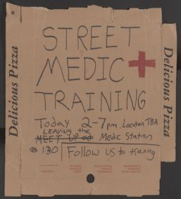 Sign announcing street medics training