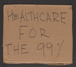 Protest sign calling for health care for the 99%